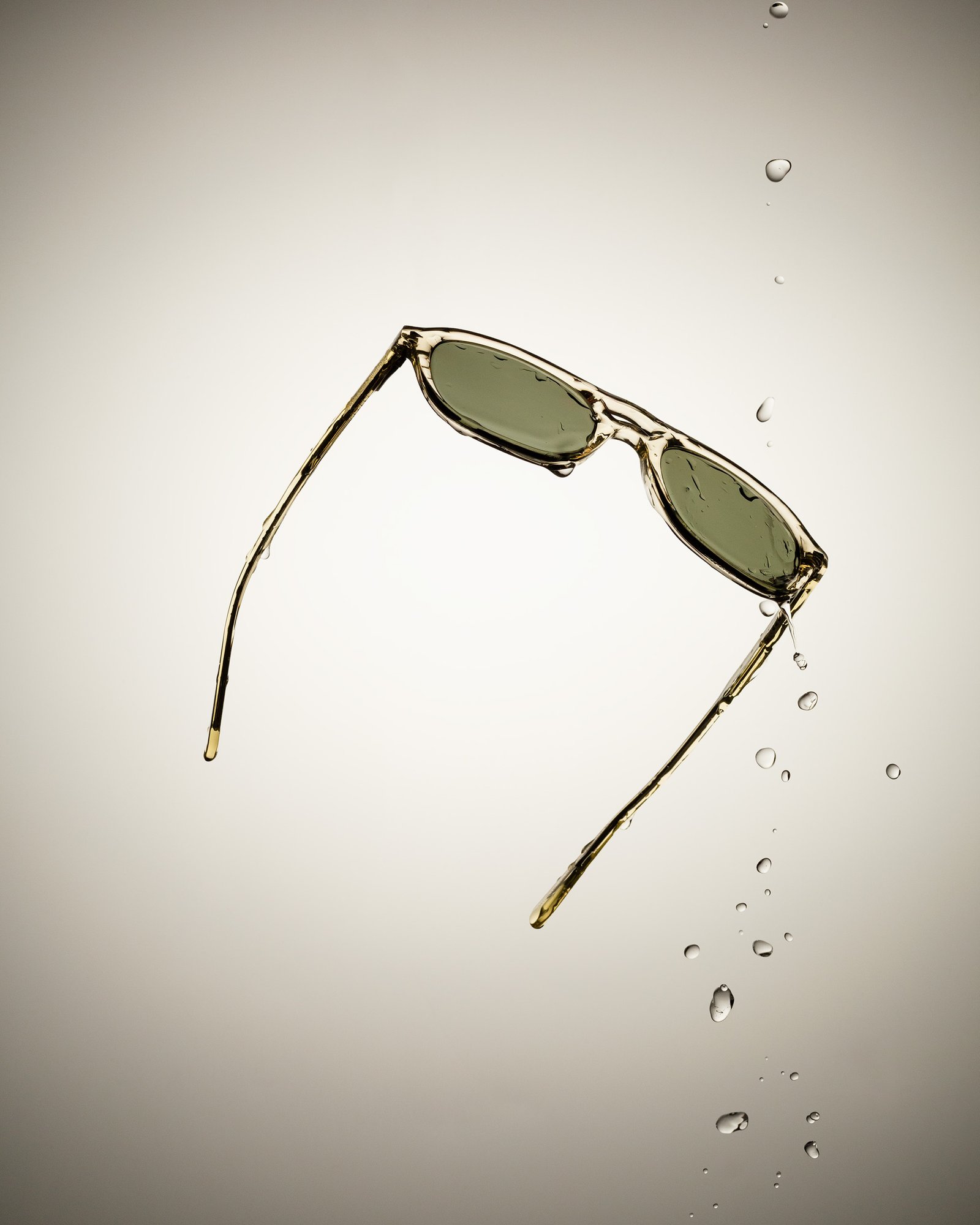 floating sunglasses and water droplets