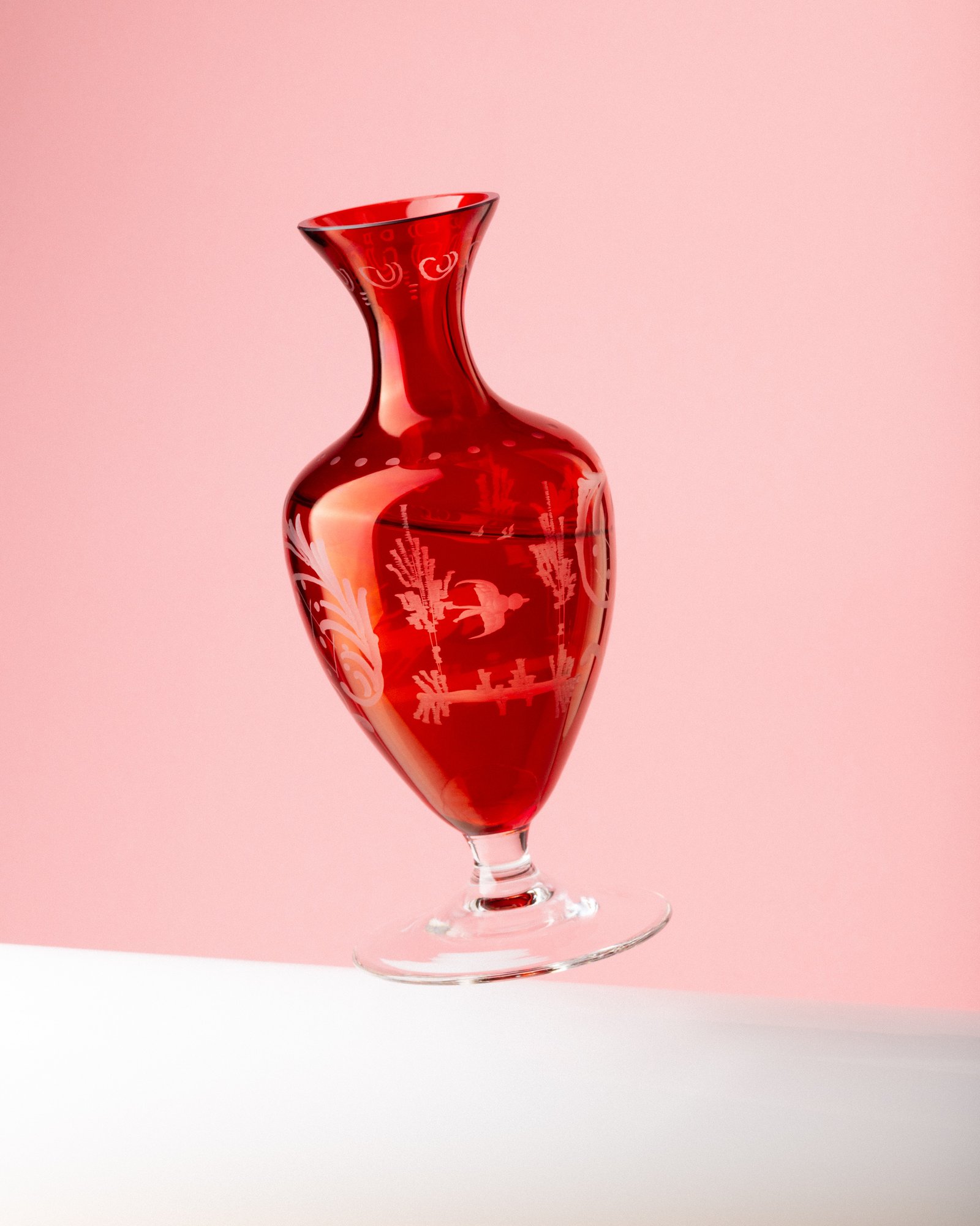 tilted red vase